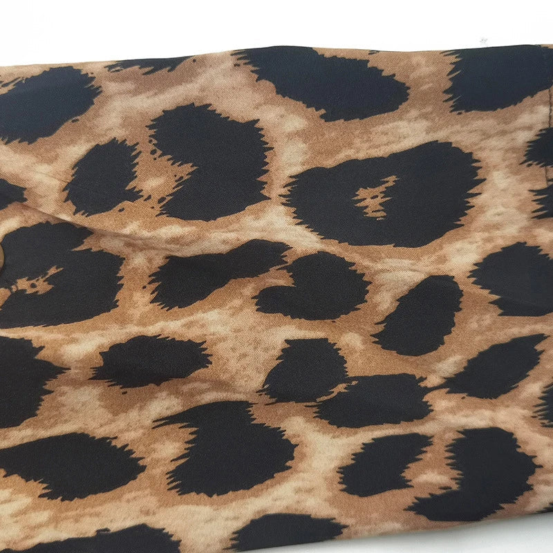 Elegant leopard print beach cover-up robe with V-neck and side pockets, perfect for summer vacations and beach parties.