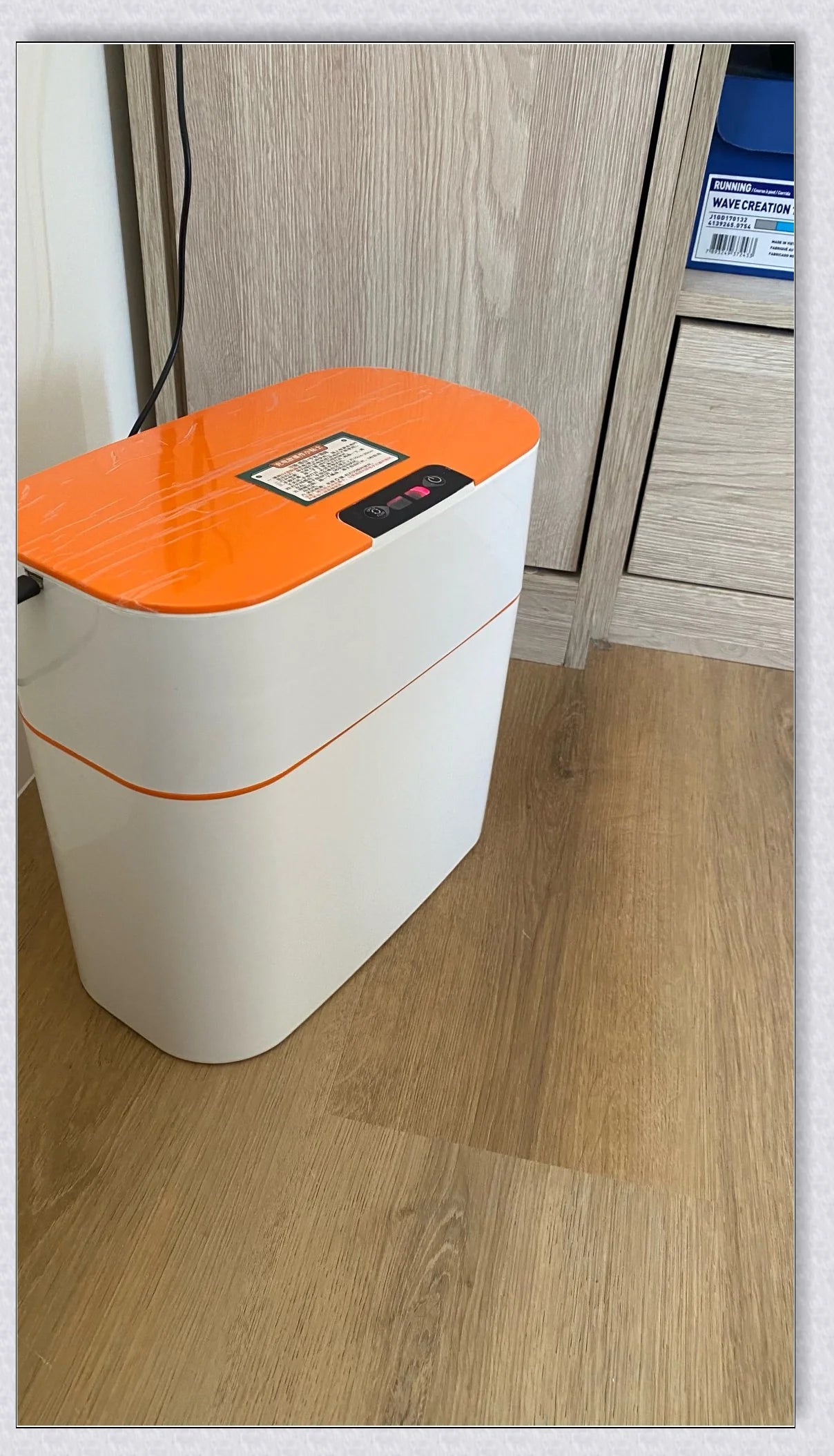 Sensor-powered bin with sleek design and touch-free motion-activated lid for effortless, hygienic waste disposal