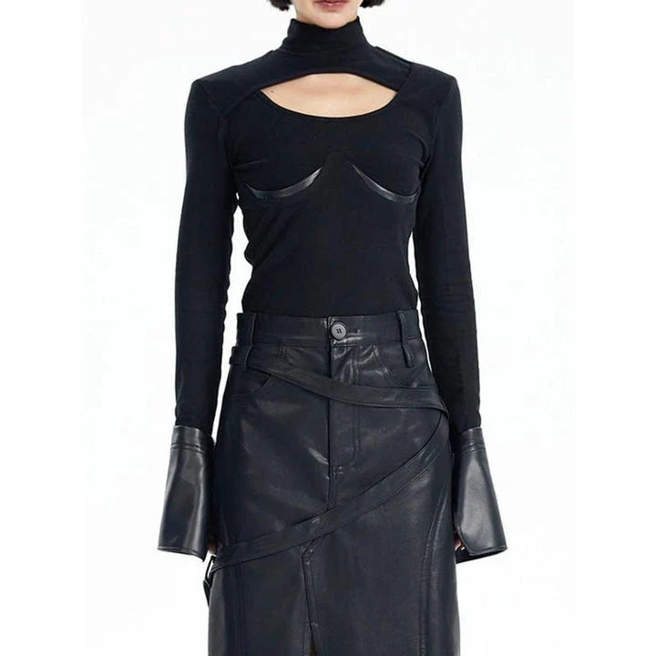 Chic knitted pullover with PU leather patchwork details, a versatile winter wardrobe essential.