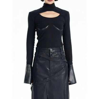 Chic knitted pullover with PU leather patchwork details, a versatile winter wardrobe essential.