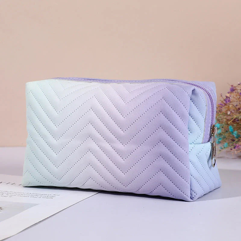 Elegant gradient-coloured makeup bag made of premium PU leather, perfect for organised storage and travel