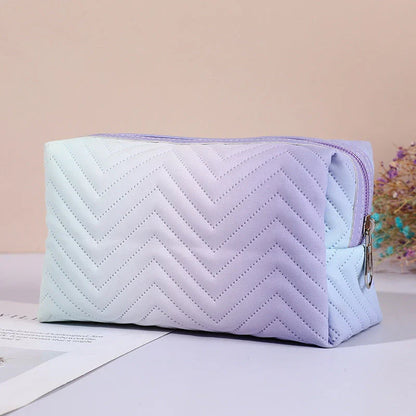 Elegant gradient-coloured makeup bag made of premium PU leather, perfect for organised storage and travel