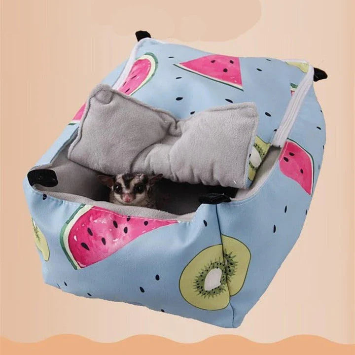 Cosy cotton pet bed in green, providing a plush and supportive sleeping surface for small animals