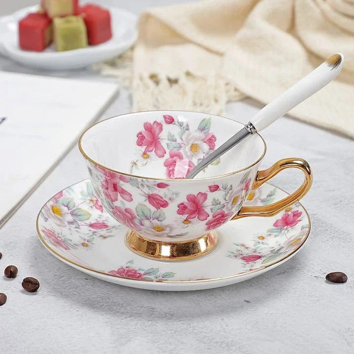 Charming floral porcelain tea set with cup, saucer, and spoon in a variety of delicate colour options