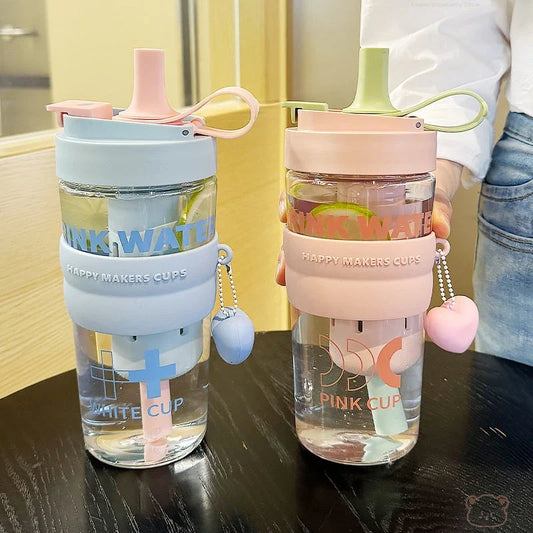 27oz water bottle with straw filter cover in pink, green, and blue colours for stylish hydration on the go