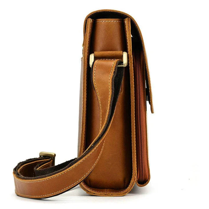 Premium leather crossbody bag with flap closure, vertical square shape, and multiple interior compartments