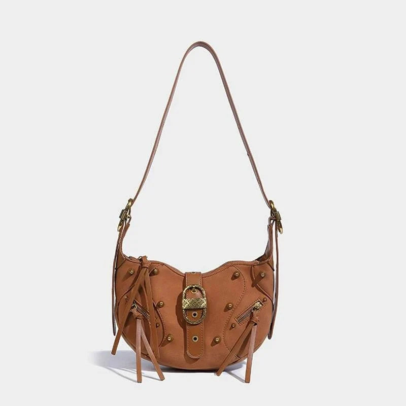 Stylish pink leather sling crossbody daypack with adjustable strap and smooth zipper closure