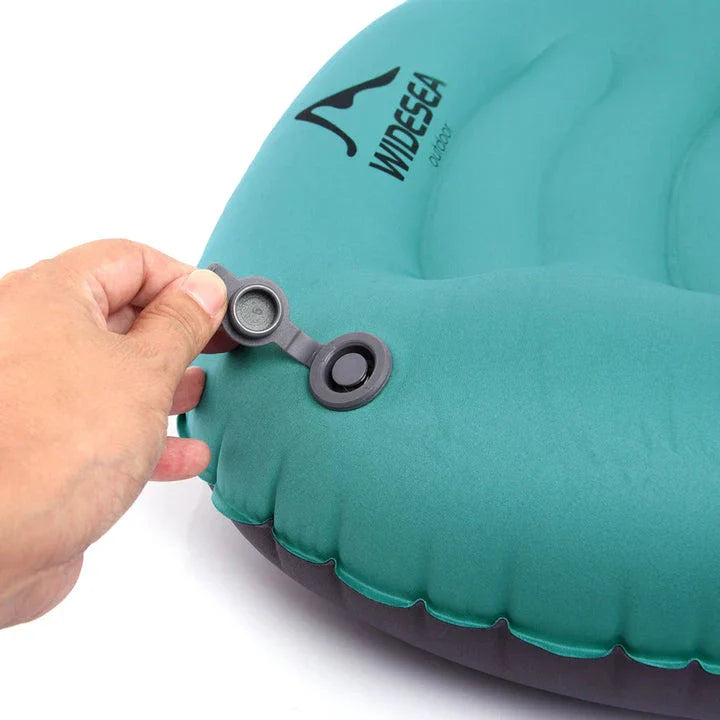 Premium inflatable camping pillow with ergonomic design for outdoor comfort and support