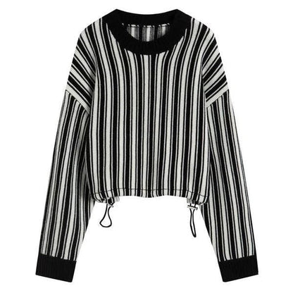 A chic striped wool-blend jumper in black, featuring an elegant O-neck design and a relaxed, flattering fit