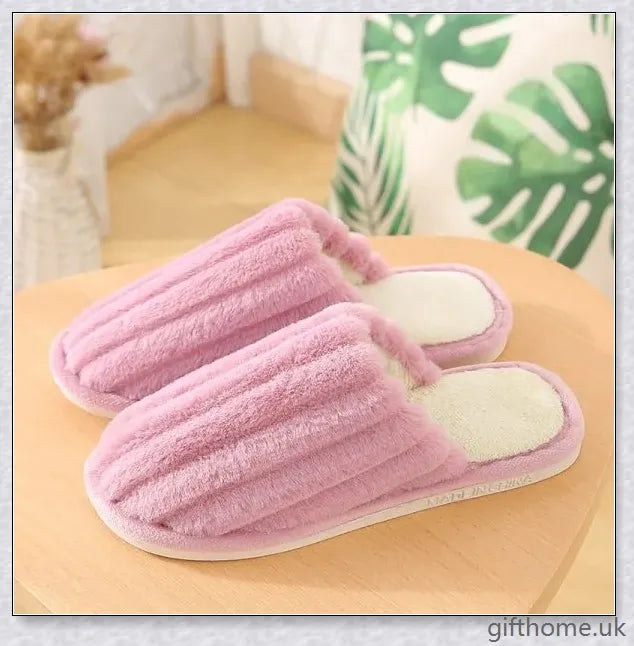 Cosy cotton house slippers with bow detail, available in a variety of colours for indoor comfort and style