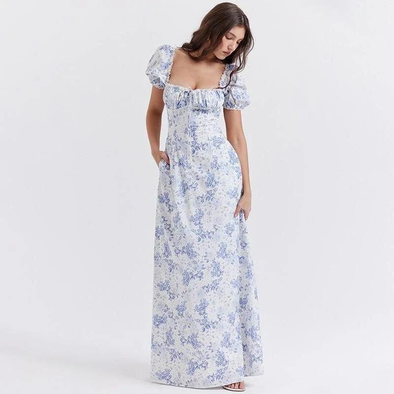 Elegant long maxi summer dress in blue with a flattering fit and flare silhouette, perfect for parties and nights out.