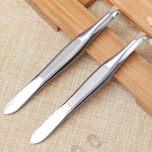 Set of two premium stainless steel hair removal tweezers in a stylish case for effortless grooming