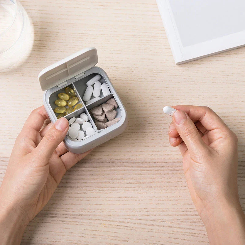 Compact 4-Grid Nordic Pill Box - Stylish and Practical Medication Organiser with Separate Compartments