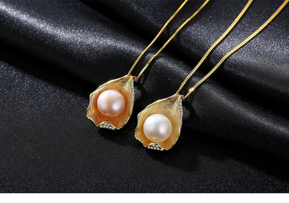 Elegant pearl pendant necklace with sterling silver setting, featuring a modern geometric design