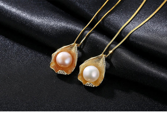 Elegant pearl pendant necklace with sterling silver setting, featuring a modern geometric design
