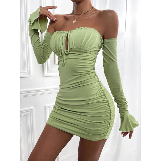 A green off-shoulder lace-up bodycon mini dress with trumpet sleeves and a backless design.