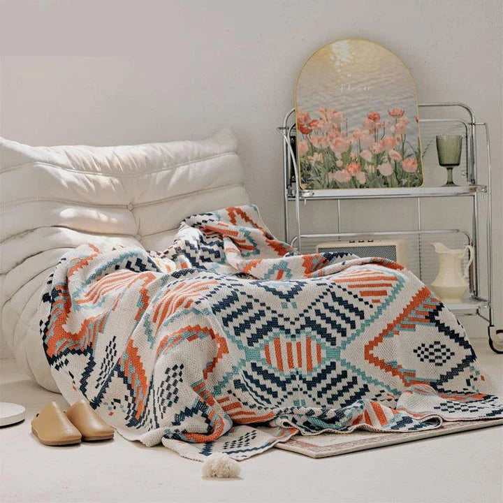 Boho geometric design cotton blanket in various sizes, perfect for indoor and outdoor use