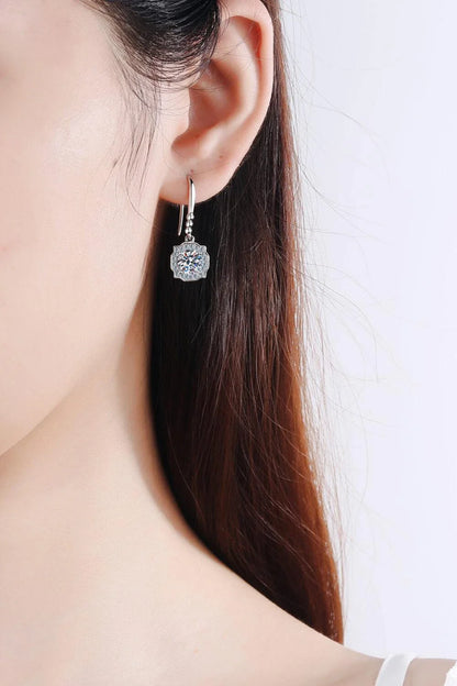 Pair of 925 sterling silver earrings featuring sparkling moissanite stones and zircon accents