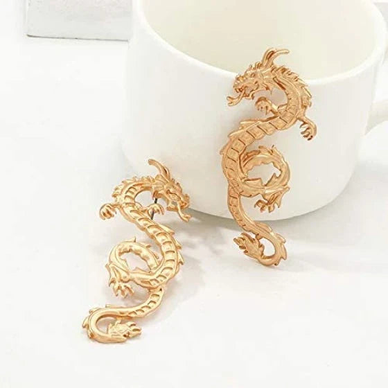 Stunning gold-coloured dragon stud earrings with intricate details, a fashionable accessory for UK customers