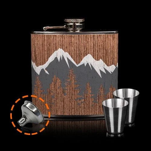 Stylish mountain-themed stainless steel and wood hip flask with optional glasses, perfect for outdoor adventures and social gatherings.