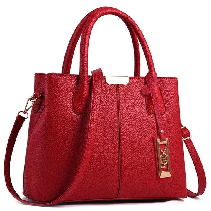 A stylish one-shoulder tote bag in various colours, made of premium polyester with an adjustable strap and spacious interior for the modern professional woman.