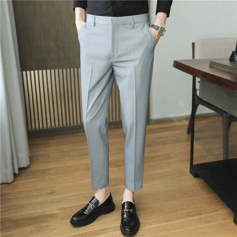 Premium men's suit trousers in a variety of colours, featuring a subtle textured drape and exceptional stretch for all-day comfort and style.