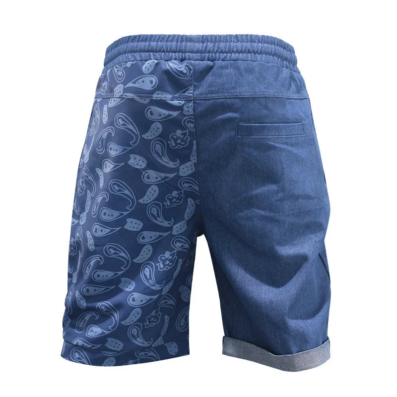 Relaxed-fit sports shorts in light blue and denim blue mosaic patterns, designed for casual everyday wear