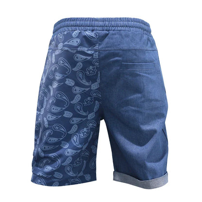 Relaxed-fit sports shorts in light blue and denim blue mosaic patterns, designed for casual everyday wear