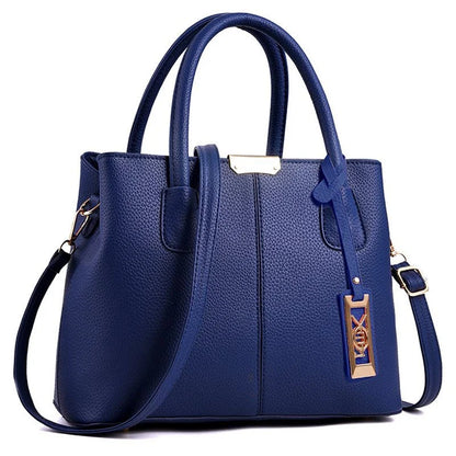 A stylish one-shoulder tote bag in various colours, made of premium polyester with an adjustable strap and spacious interior for the modern professional woman.