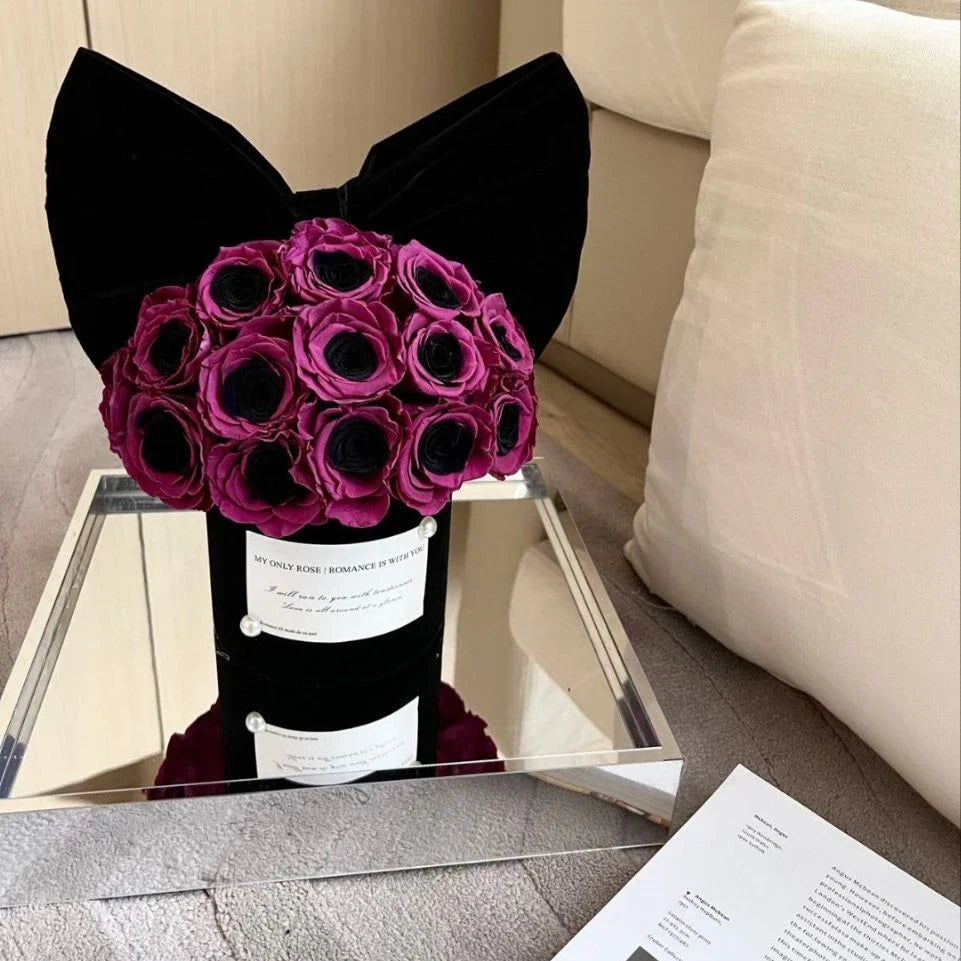 Elegant black plum bow flower pot with preserved plum blossoms, a sophisticated and long-lasting home decor piece