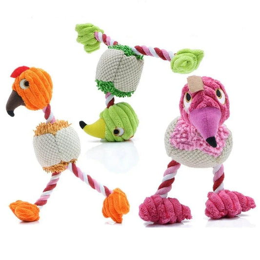 A plush, bird-shaped dog toy in a pink colour. It is designed to encourage chewing and snuggling behaviour in dogs.