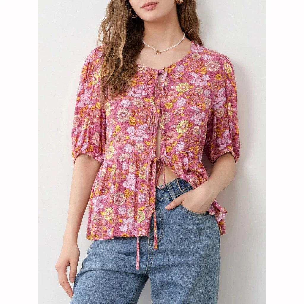 Elegant floral lace blouse with bow v-neck, showcasing vintage charm and modern comfort