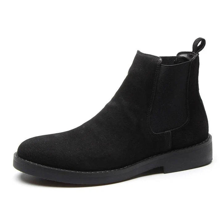 Stylish British-crafted Martin boots with a microfibre upper, pointed toe, and rubber sole for superior comfort and stability.