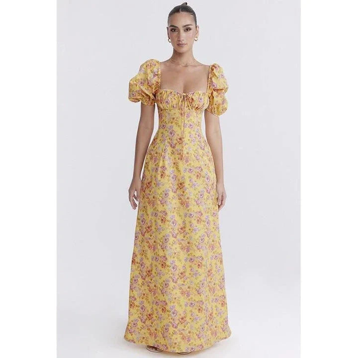 Elegant long maxi summer dress in blue with a flattering fit and flare silhouette, perfect for parties and nights out.