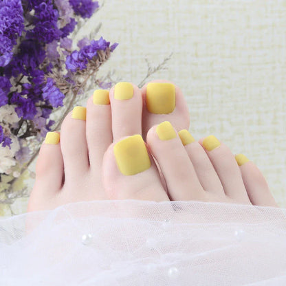Premium white matte full coverage press-on toenails with secure adhesive for a flawless at-home pedicure