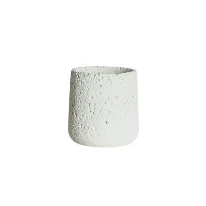 A modern, perforated cement bonsai planter in a Nordic-inspired design, available in various sizes and colours.