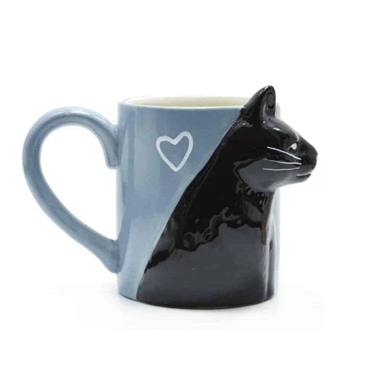 A pair of ceramic mugs featuring a charming design of two kissing cats, perfect for couples and cat lovers
