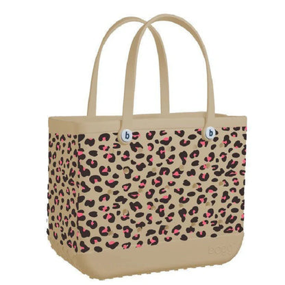 Premium waterproof beach tote bag in various vibrant colours, featuring spacious main compartment and multiple pockets for organised storage