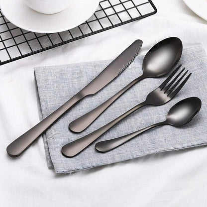 Premium eco-friendly stainless steel tableware set including knife, fork, spoon, and tea spoon in a sophisticated frosted finish