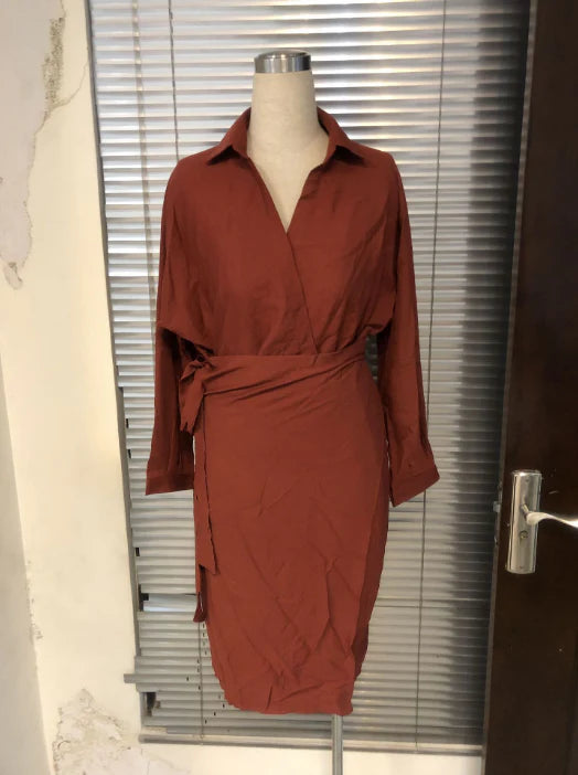Irregular wrap dress in beige with a unique, contemporary design and premium cotton blend fabric