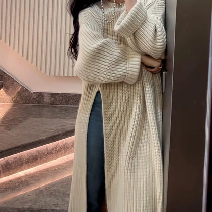 Relaxed mid-length jumper dress in a variety of colours, featuring an A-line silhouette and premium knit fabric for a comfortable, flattering fit.