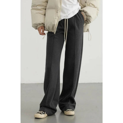 Premium high-waisted striped wide-leg trousers for stylish women, featuring a pleated front and brushed fabric for comfort