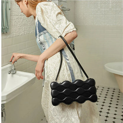 Premium embossed pearl chain handbag in fashionable shades with a soft, comfortable handle for hands-free carrying