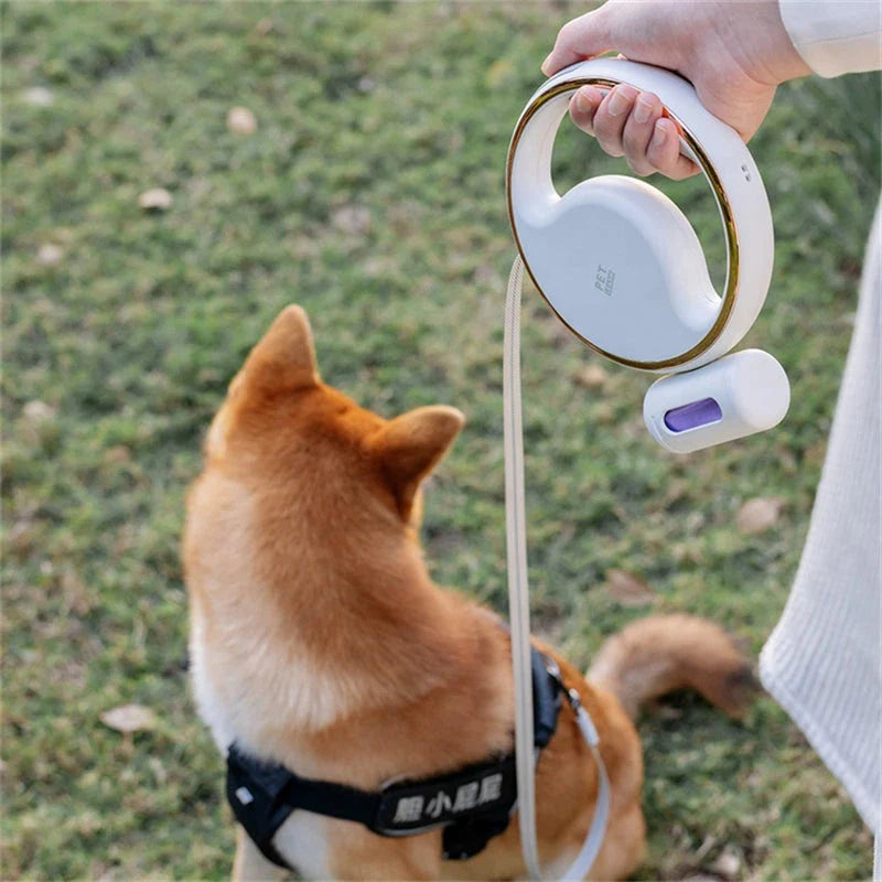 A 3m retractable dog leash with a built-in flashlight and waste bag holder, designed for convenient and safe dog walking.