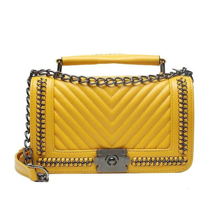Fashionable leather messenger bag with chain strap in a range of vibrant colours, designed for style and functionality
