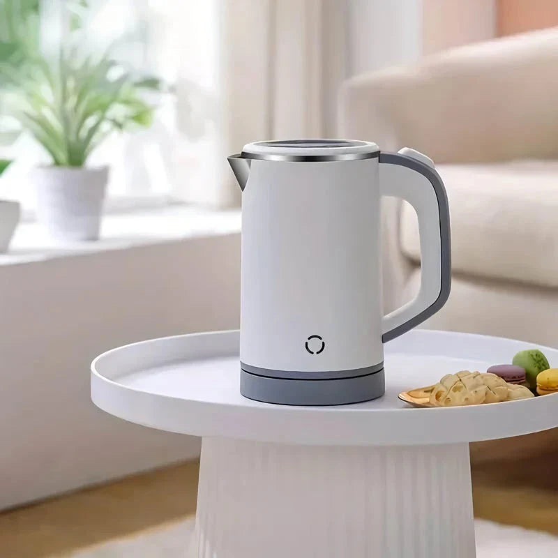 Compact stainless steel electric kettle with fast heating, cordless convenience, and durable construction