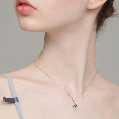 Elegant sterling silver diamond-inspired necklace with a sleek, geometric design