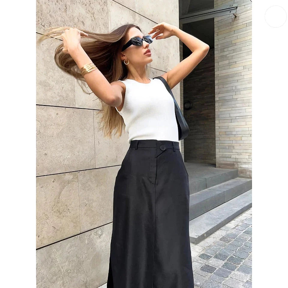 Elegant black ankle-length A-line skirt with pockets, made of high-quality polyester, spandex, and viscose blend fabric