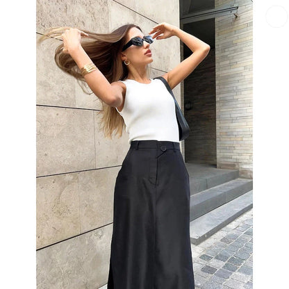 Elegant black ankle-length A-line skirt with pockets, made of high-quality polyester, spandex, and viscose blend fabric