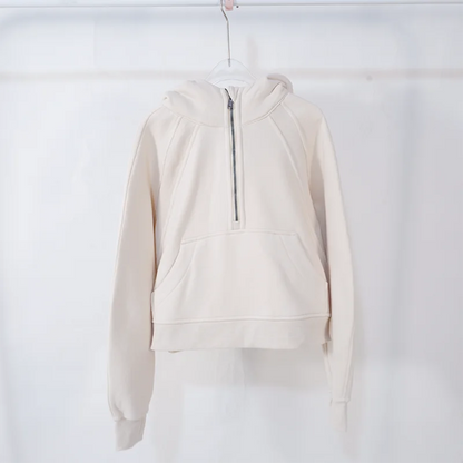 Premium women's sports fleece hoodie with half zip, available in a range of sophisticated colours